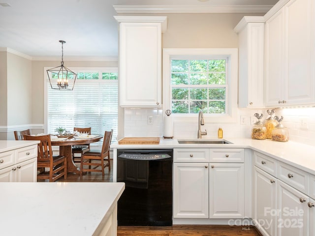 7040 Edenderry Dr, Charlotte, NC 28270 - kitchen featuring dishwasher, a sink, tasteful backsplash, a chandelier, and crown molding