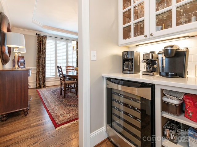 7040 Edenderry Dr, Charlotte, NC 28270 - indoor dry bar with wine cooler, ornamental molding, and wood finished floors