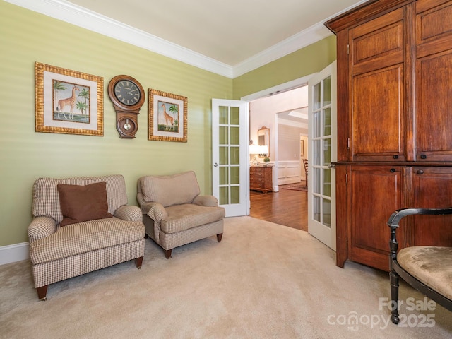 7040 Edenderry Dr, Charlotte, NC 28270 - sitting room with french doors, light carpet, and ornamental molding