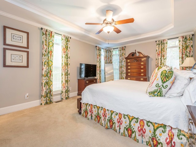 7040 Edenderry Dr, Charlotte, NC 28270 - carpeted bedroom with crown molding, a raised ceiling, baseboards, and ceiling fan