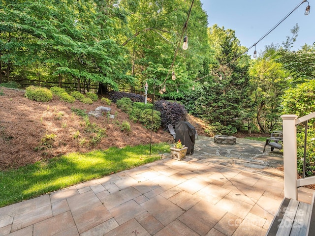 7040 Edenderry Dr, Charlotte, NC 28270 - view of patio / terrace with an outdoor fire pit