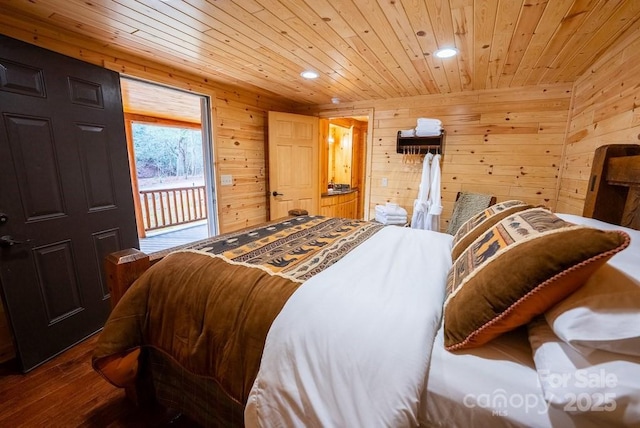 bedroom with access to exterior, recessed lighting, wooden walls, wooden ceiling, and wood finished floors