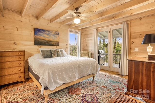 60 Laurel Ln, Mars Hill, NC 28754 - bedroom with access to exterior, wooden walls, wood finished floors, beamed ceiling, and wood ceiling