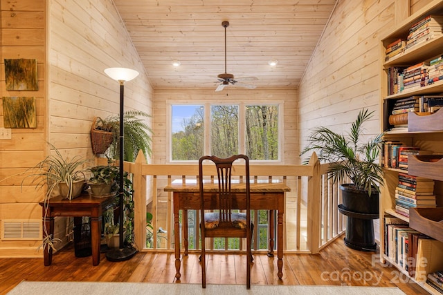 60 Laurel Ln, Mars Hill, NC 28754 - dining room featuring hardwood / wood-style flooring, ceiling fan, wood ceiling, wood walls, and high vaulted ceiling