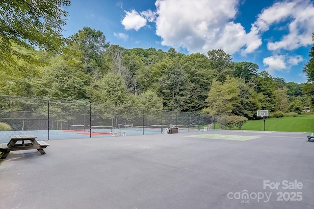 60 Laurel Ln, Mars Hill, NC 28754 - view of property's community with a tennis court, fence, and a view of trees
