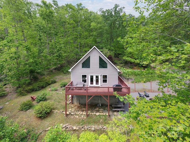25 Licklog Ridge Rd, Fairview, NC 28730 - back of house featuring a wooden deck, a wooded view, and french doors