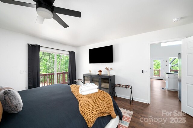 25 Licklog Ridge Rd, Fairview, NC 28730 - bedroom featuring access to outside, wood finished floors, ceiling fan, and baseboards