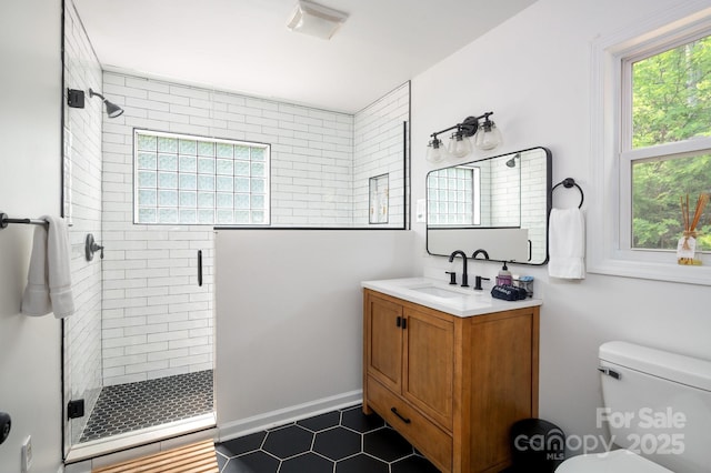 25 Licklog Ridge Rd, Fairview, NC 28730 - full bath with a stall shower, vanity, tile patterned floors, and toilet