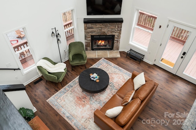 25 Licklog Ridge Rd, Fairview, NC 28730 - living area featuring a fireplace, wood finished floors, and baseboards