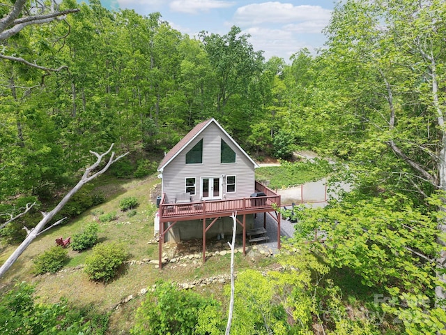 25 Licklog Ridge Rd, Fairview, NC 28730 - back of house with a wooden deck, a wooded view, and french doors