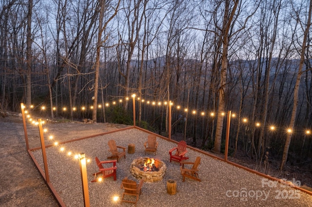 25 Licklog Ridge Rd, Fairview, NC 28730 - view of patio with an outdoor fire pit