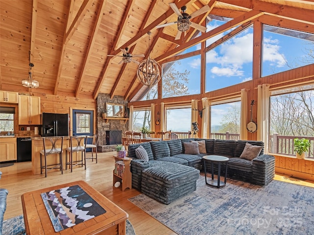 16 Sutton Knob Rd, Maggie Valley, NC 28751 - living area with wooden ceiling, a chandelier, a ceiling fan, light wood-style flooring, and healthy amount of natural light