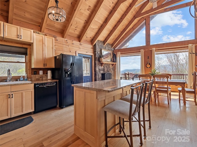 16 Sutton Knob Rd, Maggie Valley, NC 28751 - kitchen with black appliances, a sink, light brown cabinetry, light wood finished floors, and wooden ceiling