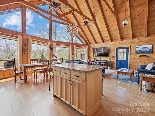 16 Sutton Knob Rd, Maggie Valley, NC 28751 - kitchen with open floor plan, high vaulted ceiling, ceiling fan, wood ceiling, and light brown cabinets