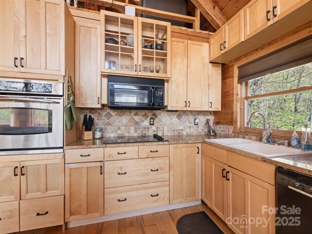 16 Sutton Knob Rd, Maggie Valley, NC 28751 - kitchen featuring black appliances, light brown cabinetry, a sink, backsplash, and beamed ceiling