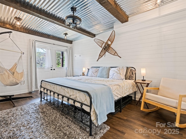 16 Sutton Knob Rd, Maggie Valley, NC 28751 - bedroom with wood finished floors, beamed ceiling, wooden walls, and french doors