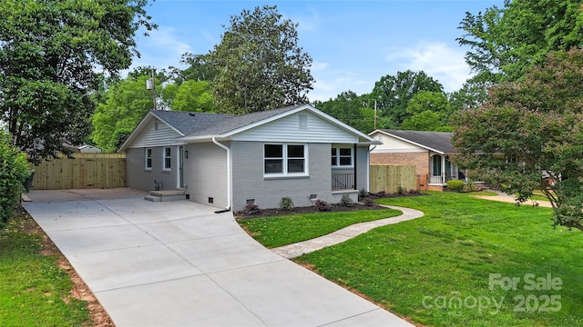 4042 Uppergate Ln, Charlotte, NC 28215 - view of front facade with concrete driveway and brick siding