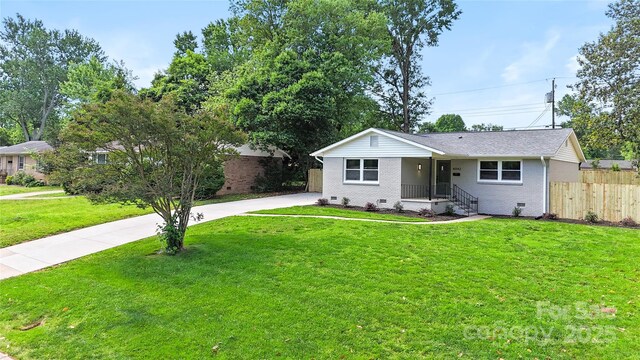 4042 Uppergate Ln, Charlotte, NC 28215 - view of front of property with crawl space, concrete driveway, and brick siding