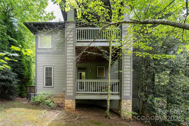 4 Yellow Owl Ct, Biltmore Lake, NC 28715 - rear view of house featuring a balcony, a porch, central AC unit, and crawl space