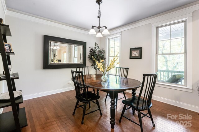 4 Yellow Owl Ct, Biltmore Lake, NC 28715 - dining space with baseboards, dark wood-style flooring, ornamental molding, and a chandelier