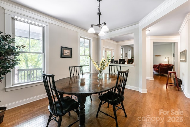 4 Yellow Owl Ct, Biltmore Lake, NC 28715 - dining space with a chandelier, light wood-type flooring, baseboards, and crown molding