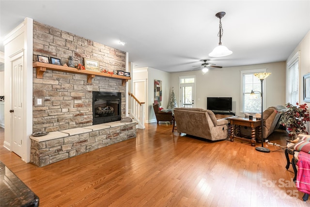 4 Yellow Owl Ct, Biltmore Lake, NC 28715 - living area with a fireplace, a ceiling fan, light wood finished floors, and stairway