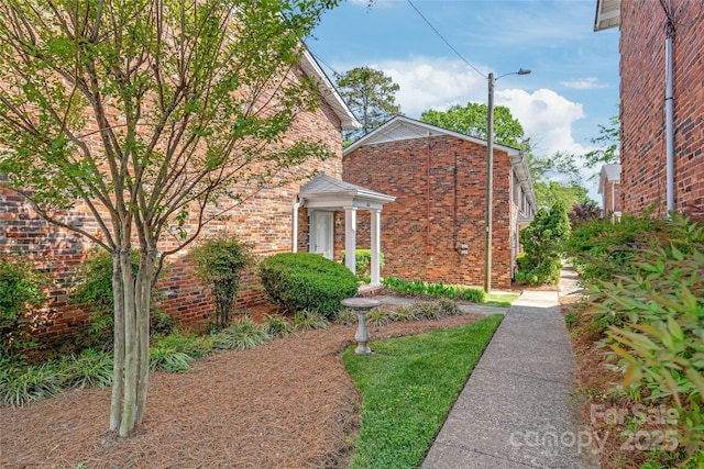 view of front of home with brick siding