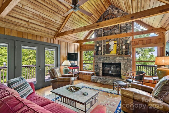 1795 Mckenzie Way N Unit 505, Old Fort, NC 28762 - living area featuring wood-type flooring, french doors, wood ceiling, ceiling fan, and beam ceiling