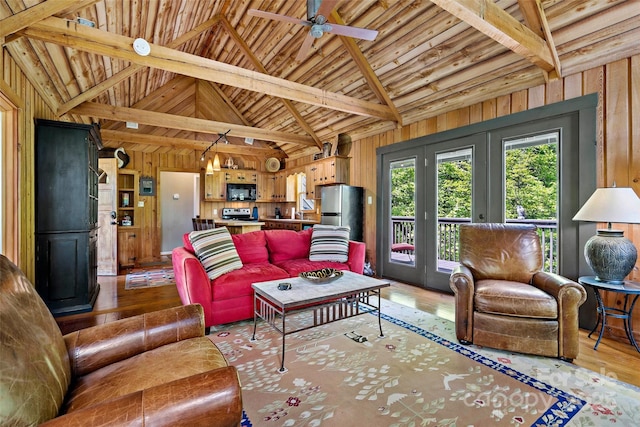1795 Mckenzie Way N Unit 505, Old Fort, NC 28762 - living room with wood finished floors, wooden walls, beamed ceiling, french doors, and a ceiling fan