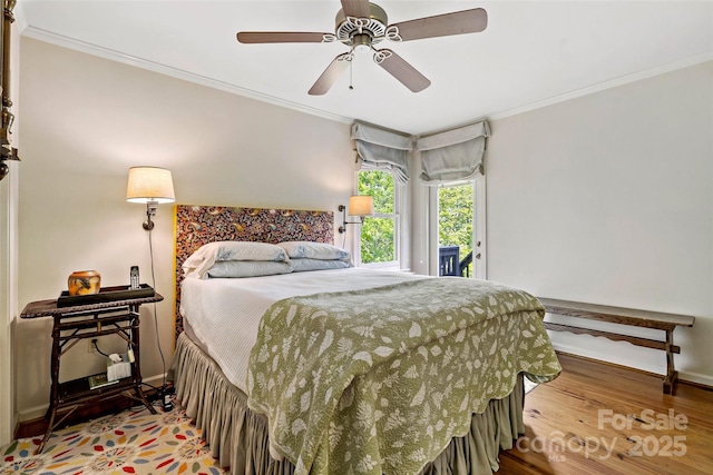 1795 Mckenzie Way N Unit 505, Old Fort, NC 28762 - bedroom with wood finished floors, ornamental molding, baseboards, a ceiling fan, and access to outside