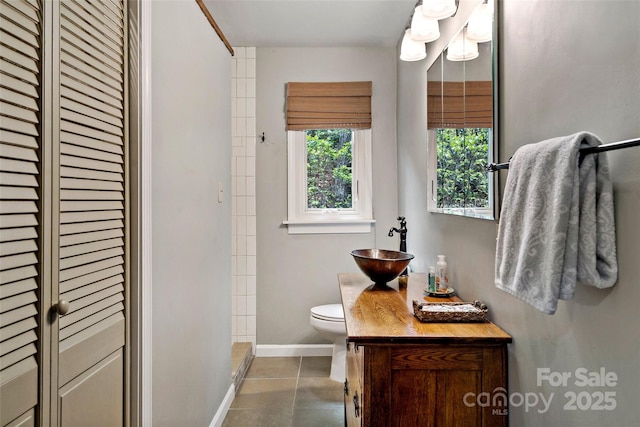 1795 Mckenzie Way N Unit 505, Old Fort, NC 28762 - bathroom featuring vanity, toilet, a shower, baseboards, and tile patterned flooring