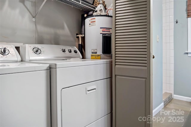 1795 Mckenzie Way N Unit 505, Old Fort, NC 28762 - clothes washing area with electric water heater, washer and clothes dryer, and baseboards