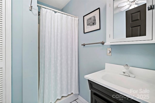 1795 Mckenzie Way N Unit 505, Old Fort, NC 28762 - bathroom featuring a shower with curtain, vanity, and ceiling fan