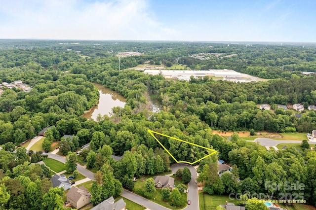 2601 Greenmont Cir, Belmont, NC 28012 - aerial view of property and surrounding area with a forest and property boundaries highlighted
