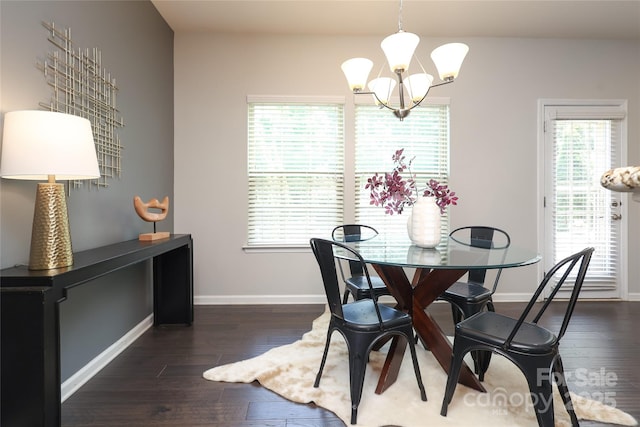 1809 Evergreen Dr, Charlotte, NC 28208 - dining area featuring hardwood / wood-style floors, a chandelier, and baseboards