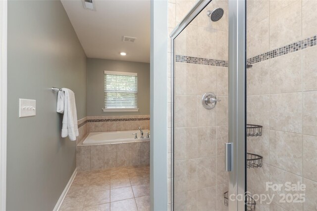 1809 Evergreen Dr, Charlotte, NC 28208 - bathroom featuring a shower stall, a bath, tile patterned flooring, recessed lighting, and baseboards