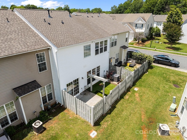 12407 Crowley Ct, Charlotte, NC 28277 - rear view of house featuring cooling unit, a shingled roof, and a residential view
