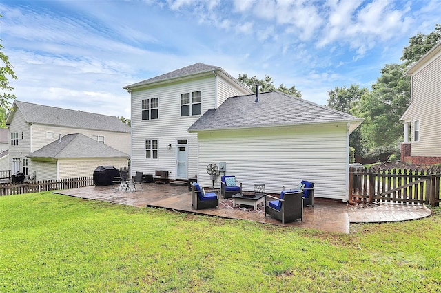 rear view of property with a patio, an outdoor hangout area, and roof with shingles