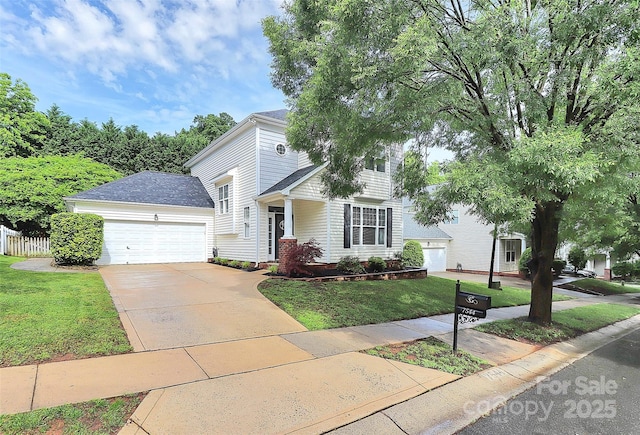view of front of property with an attached garage and concrete driveway