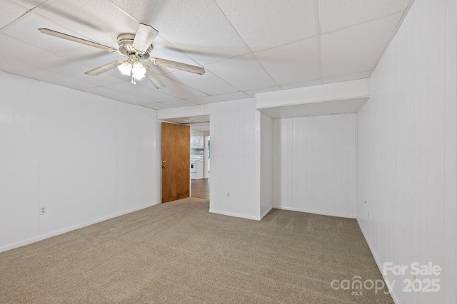 909 Pearson Falls Rd, Saluda, NC 28773 - carpeted empty room with ceiling fan, wooden walls, and baseboards