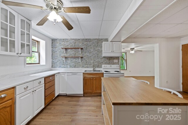 909 Pearson Falls Rd, Saluda, NC 28773 - kitchen with white appliances, wooden counters, a sink, a drop ceiling, and ceiling fan