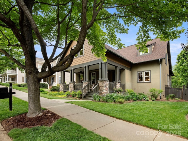 9 Dearborn St, Asheville, NC 28803 - craftsman house featuring a porch, a shingled roof, and stucco siding