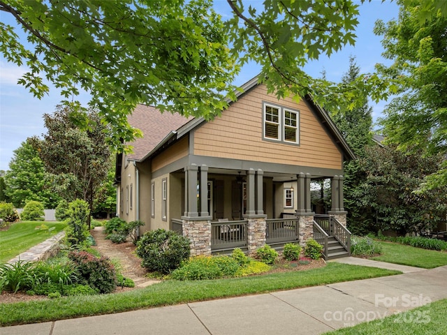 9 Dearborn St, Asheville, NC 28803 - craftsman inspired home with a porch, stucco siding, stone siding, and roof with shingles