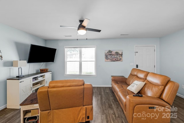 772 Austin Rd, New London, NC 28127 - living area with dark wood-style flooring, a ceiling fan, and baseboards