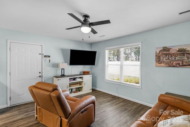 772 Austin Rd, New London, NC 28127 - living area featuring dark wood-style floors, baseboards, and ceiling fan