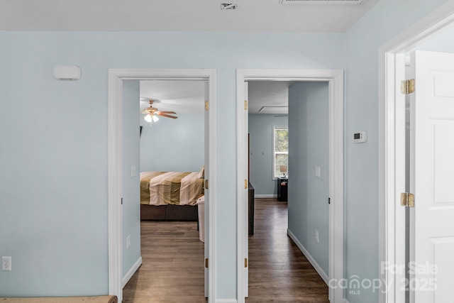 772 Austin Rd, New London, NC 28127 - hallway with dark wood-style floors and baseboards