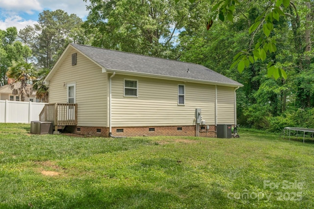 772 Austin Rd, New London, NC 28127 - view of home's exterior featuring a trampoline, crawl space, central air condition unit, and a shingled roof
