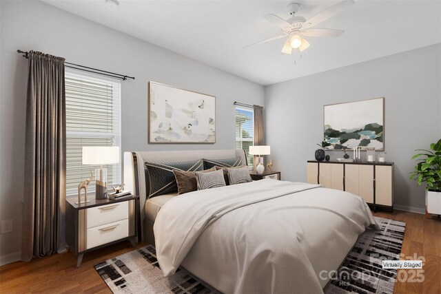 5076 Newport Lakes Dr, Rock Hill, SC 29732 - bedroom with wood finished floors, baseboards, and ceiling fan