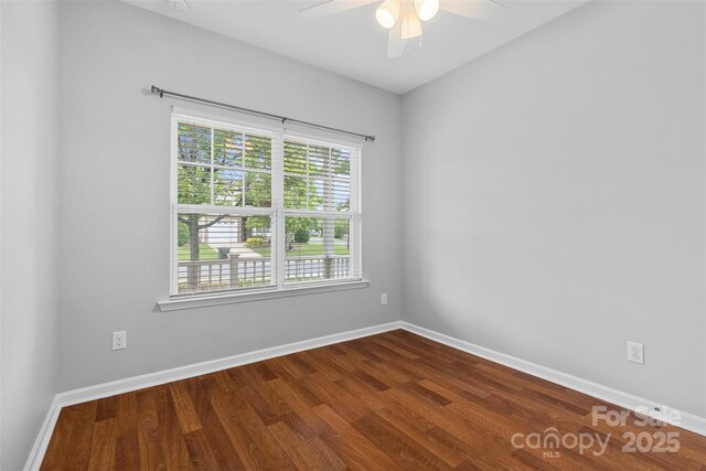5076 Newport Lakes Dr, Rock Hill, SC 29732 - empty room with ceiling fan, dark wood-type flooring, and baseboards