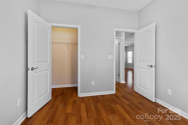 5076 Newport Lakes Dr, Rock Hill, SC 29732 - unfurnished bedroom featuring wood finished floors, baseboards, and a closet